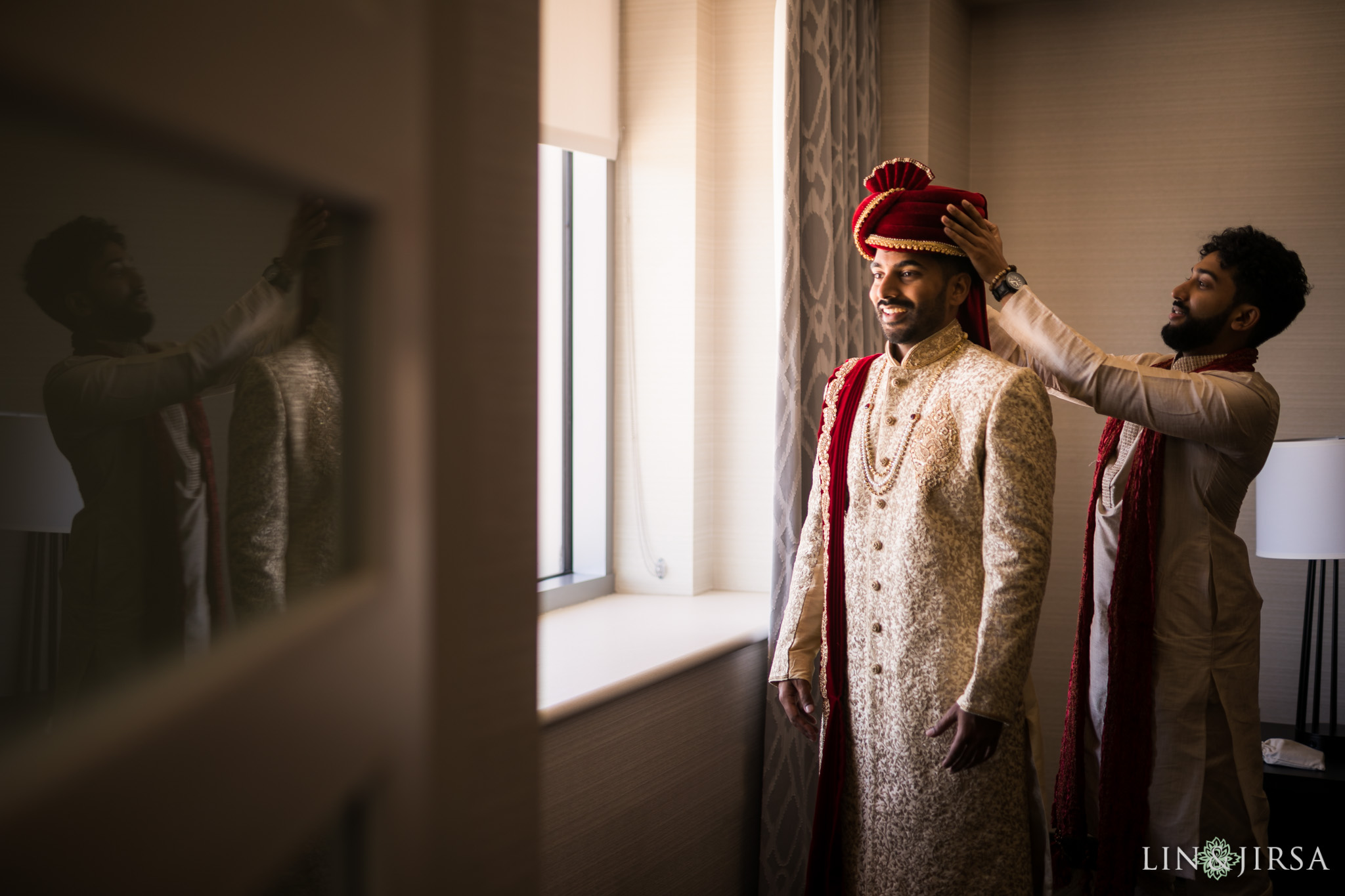 Groom in a quiet reflective moment just before the wedding ceremony at the San Jose Marriott