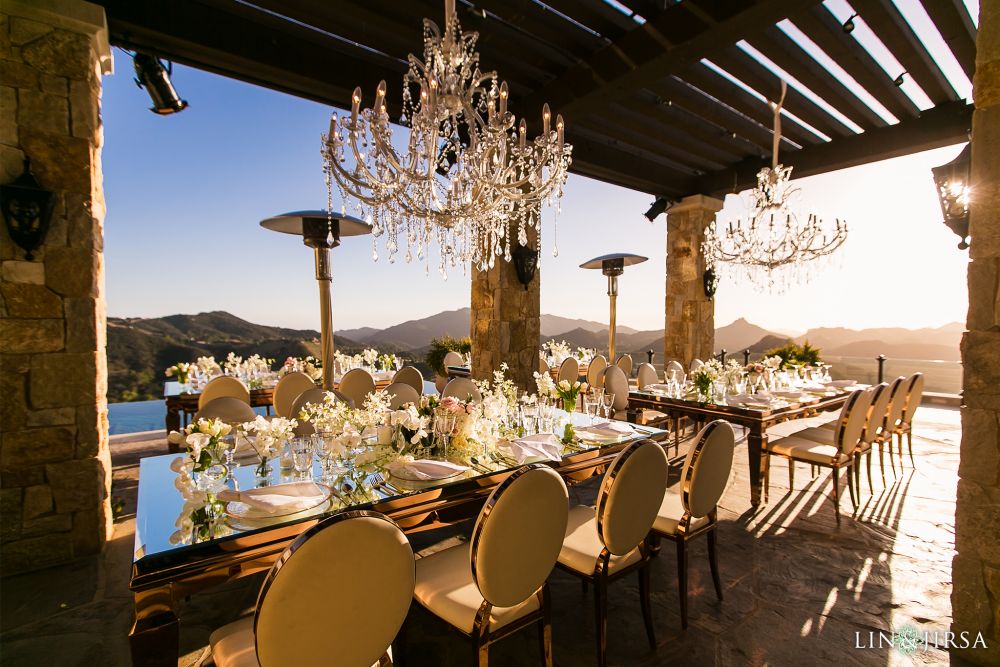 A photograph of a luxury wedding reception at the Malibu Rocky Oaks Estate, planned by Elegant Ninja and photographed by Chris Lin and Pye Jirsa