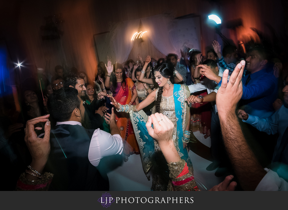 anaheim marriott indian wedding photographer wedding reception photos dancing night photo