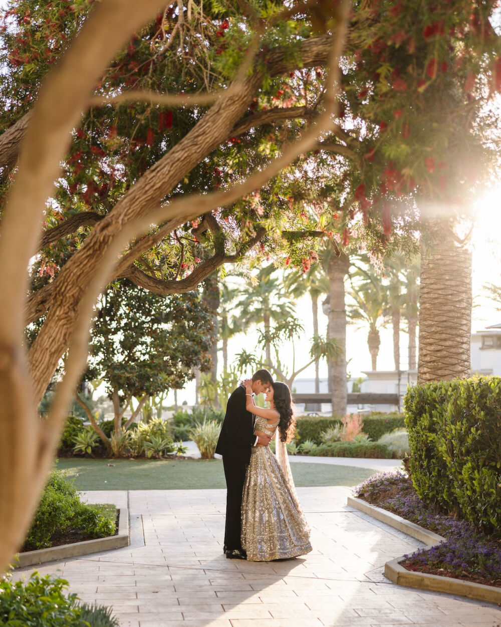 South Asian couple in an editorial-style portrait blending artistic and emotional storytelling