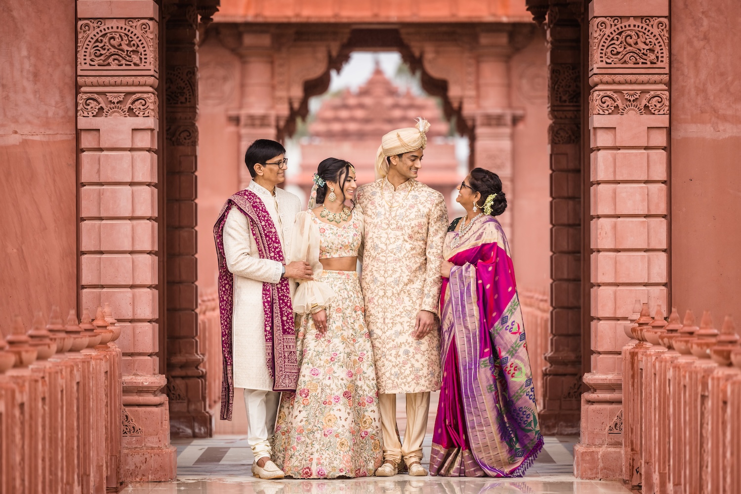 Fun grouping mixed in alongside traditional family formals at a South Asian wedding