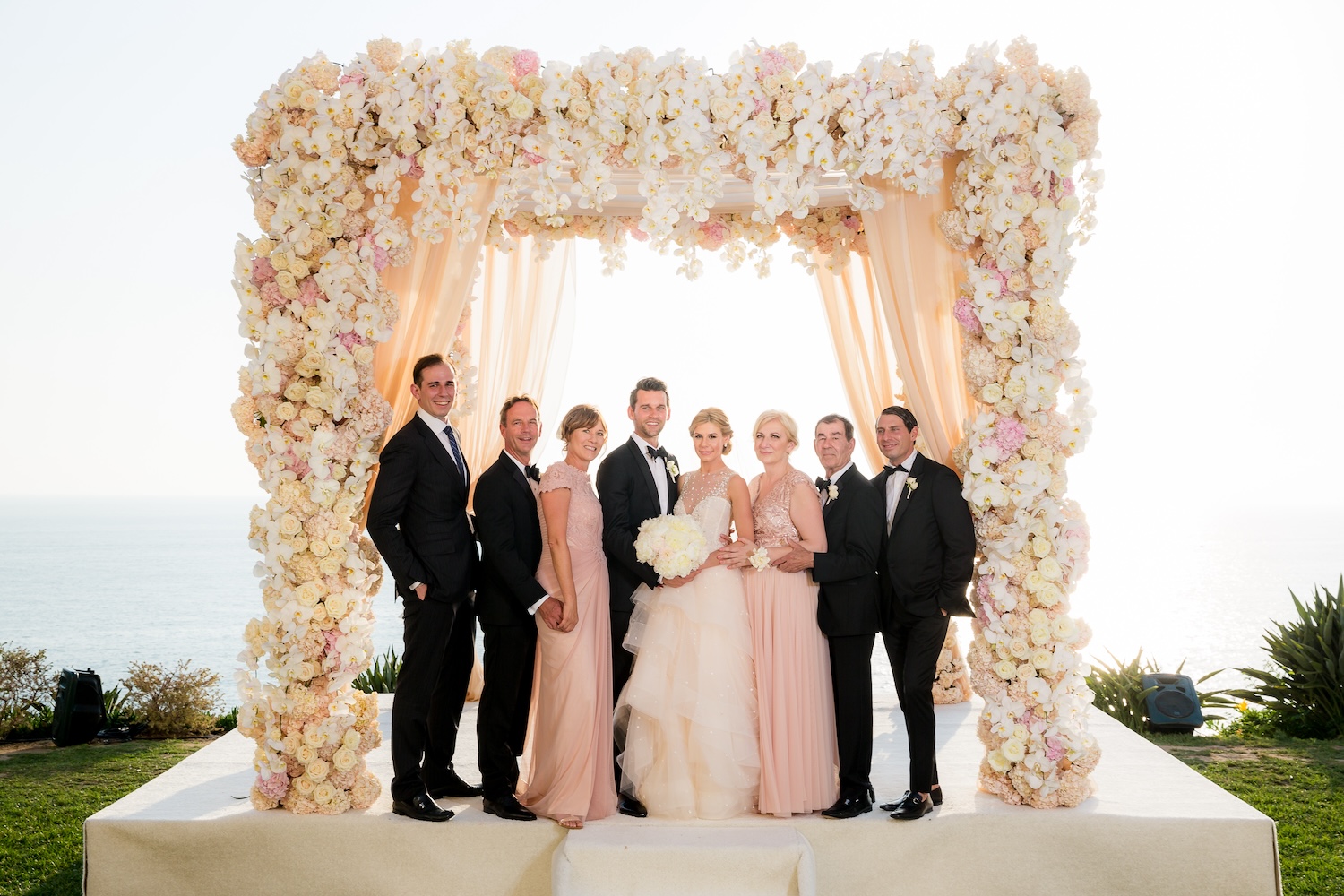 Family formal portrait in beautiful natural light during wedding day